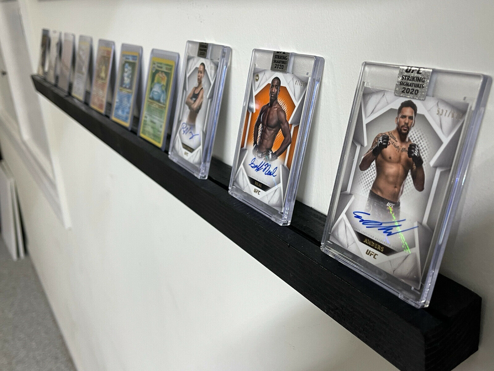 Sports And Trading Card Display Shelf. Black shelf for NFL, Pokemon cards ETC